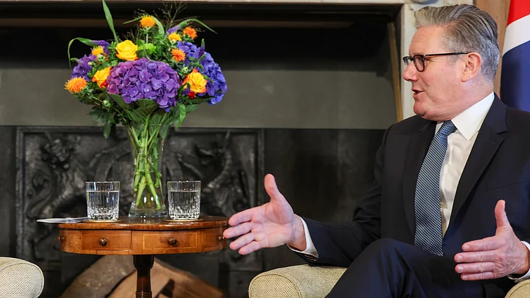 qaumiawaz_2025-09-22_t83i8dlw_Keir-Starmer-and-Modi