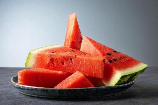 sliced-pieces-of-ripe-sweet-watermelon-lie-on-a-gr